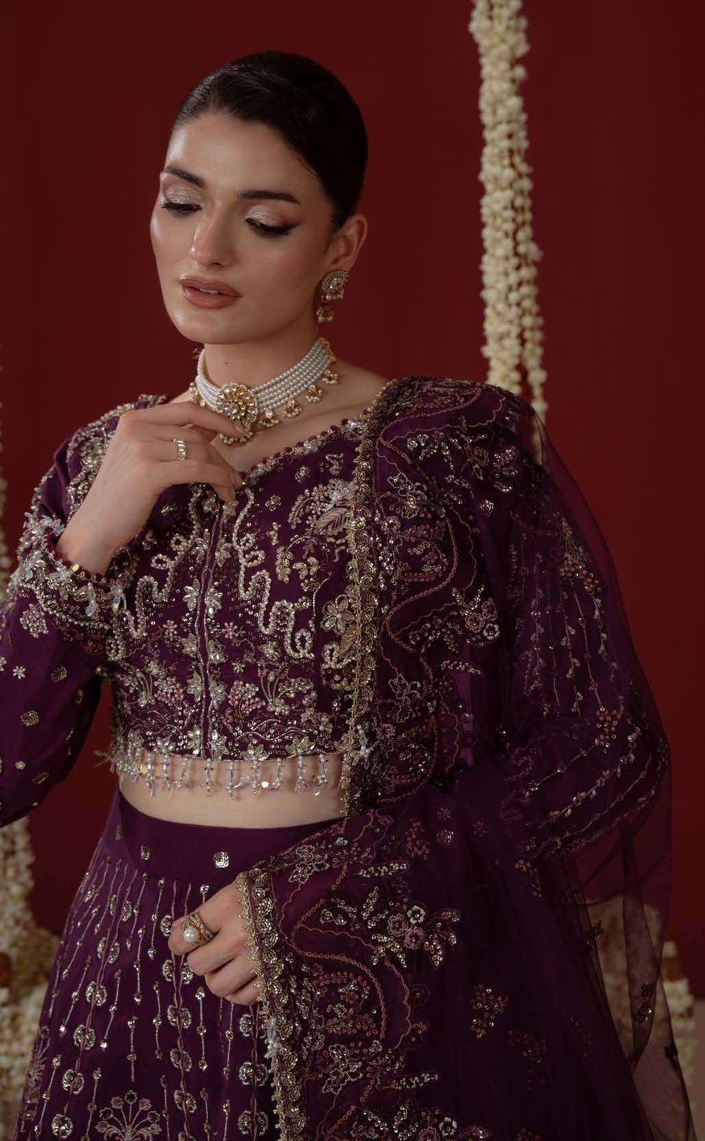 Close portrait wearing Ethereal with a pearl choker