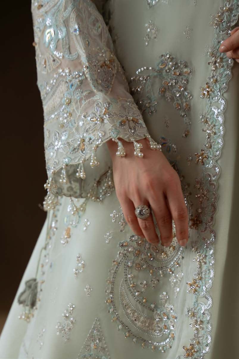 Detail of Celeste's sleeve and hem embellishment