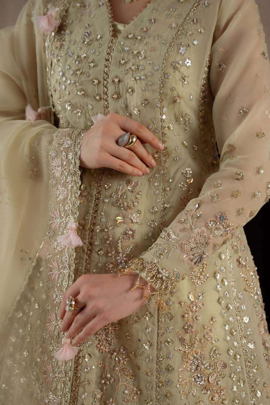 Detail of Reverie's scattered sequin and floral embellishment